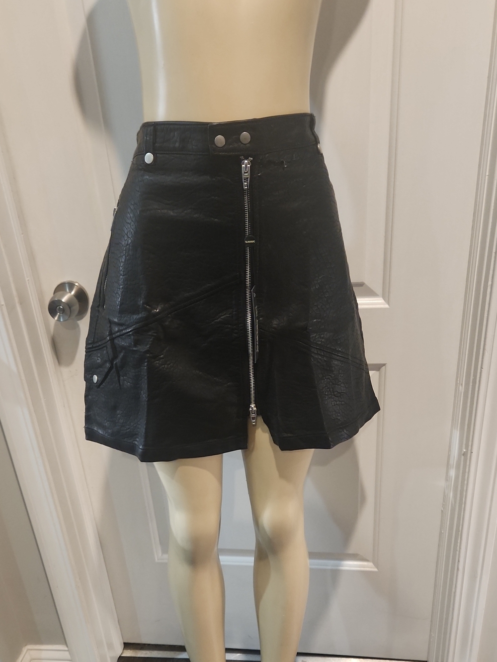 Blank NYC Black Faux Leather Front-Zip Mini Skirt
